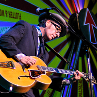 Explore photos of Elvis Costello and his Spectacular Spinning Songbook at the Fox Oakland Theatre on May 9, 2011